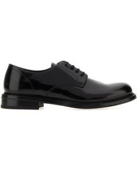 Prada - Scarpe stringate in pelle nera - Lyst
