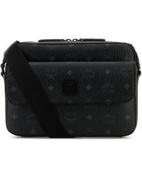 MCM - Borsa a tracolla Aren Messenger in tela stampata - Lyst