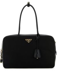 Prada - Borsa a mano nera in pelle e Re-Nylon - Lyst