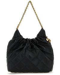 Tory Burch - Borsa a mano Fleming mini in pelle nera - Lyst