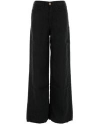 Lois - Pantalone dalla gamba ampia Skater in lino nero - Lyst