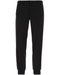 Prada - Pantalone in gabardine nero - Lyst