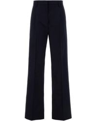 Prada - Pantalone in cotone blu navy - Lyst
