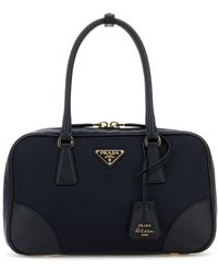 Prada - Borsa a mano Re-Edition 1978 media in tela blu notte - Lyst