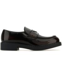 Prada - Mocassini Chocolate in pelle testa di moro - Lyst