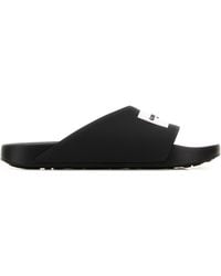 Givenchy - Black Rubber Label Slippers - Lyst