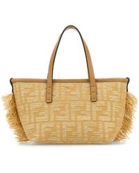 Fendi - Borsa a mano Roll mini in rafia ricamata - Lyst