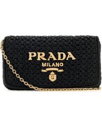 Prada - Borsa a tracolla in rafia nera - Lyst