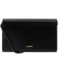 Jil Sander - Portafoglio Tangle in pelle nera - Lyst