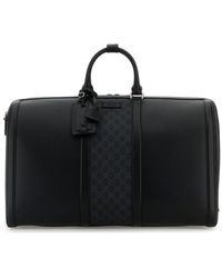 Gucci - Borsa da viaggio in tela nera - Lyst