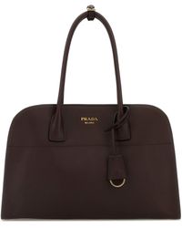 Prada - Borsa shopping media in pelle melanzana - Lyst