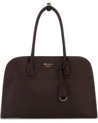 Prada - Borsa shopping media in pelle melanzana - Lyst