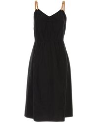 Prada - Abito in misto lino nero - Lyst