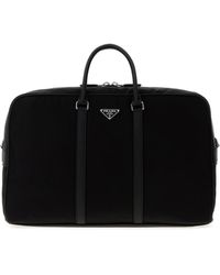 Prada - Borsa da viaggio in Re-Nylon nero - Lyst