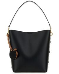 Stella McCartney - Borsa a secchiello Frayme in alter mat nero - Lyst