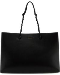 Jil Sander - Borsa shopping Tangle in pelle nera - Lyst