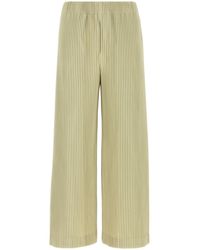 Homme Plissé Issey Miyake - Pantalone dalla gamba ampia in poliestere verde pistacchio - Lyst