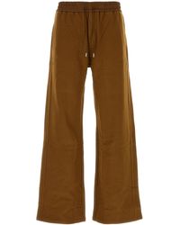 Saint Laurent - Pantalone jogging in cotone marrone - Lyst