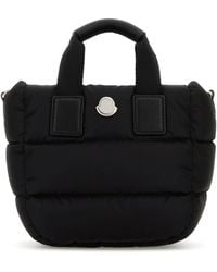 Moncler - Borsa a mano Caradoc mini in tessuto nero - Lyst