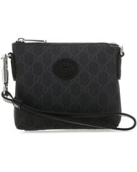 Gucci - Clutch in tessuto GG Supreme nero - Lyst