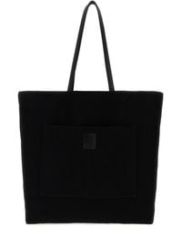 The Row - Borsa shopping Tori in tela nera - Lyst