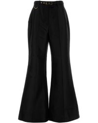 Zimmermann - Pantalone a zampa Hypnotic in misto lana nera - Lyst