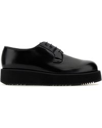 Prada - Scarpe stringate in pelle nera - Lyst