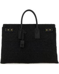 Saint Laurent - Borsa shopping Sac De Jour media in rafia nera - Lyst