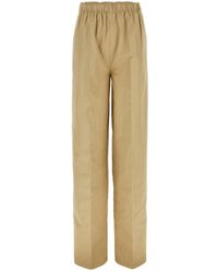 Prada - Pantalone dalla gamba ampia in cotone beige - Lyst