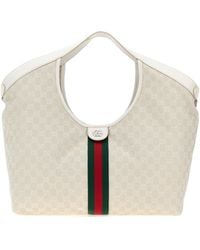 Gucci - Borsa shopping Giglio grande in tessuto GG - Lyst