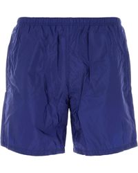 Prada - Bermuda mare in Re-Nylon blu - Lyst