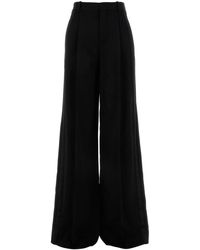 Saint Laurent - Pantalone dalla gamba ampia in lana nera - Lyst