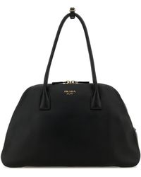Prada - Borsa shopping media in pelle nera - Lyst