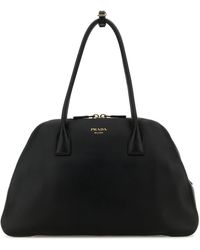 Prada - Borsa shopping media in pelle nera - Lyst