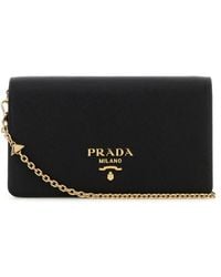 Prada - Borsa a tracolla mini in pelle nera - Lyst