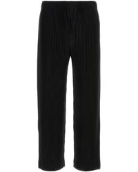 Homme Plissé Issey Miyake - Pantalone in poliestere nero - Lyst