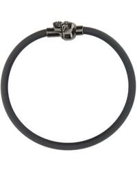 McQueen - Bracciale Skull in gomma nera - Lyst