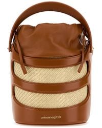 McQueen - Borsa a secchiello The Rise bicolor in pelle e rafia - Lyst