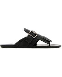 Prada - Slippers infradito Shuffle in pelle nera - Lyst