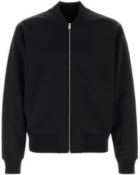 Prada - Bomber in poliestere stretch nero - Lyst