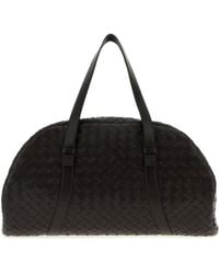 Bottega Veneta - Borsa da viaggio in pelle testa di moro - Lyst