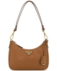 Prada - Borsa a spalla Re-Edition mini in pelle caramello - Lyst