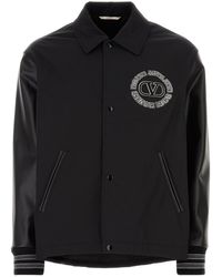 Valentino Garavani - Giacca a vento in misto poliestere nero - Lyst