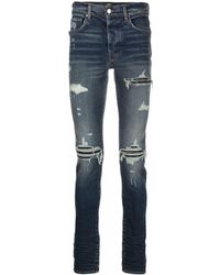 Amiri Jeans skinny con effetto vissuto - Blu