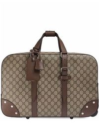 gucci rolling luggage