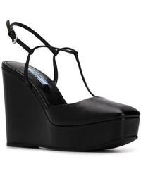 Prada Wedge sandals for Women - Up to 75% off at Lyst.com