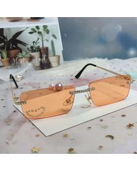 Ghoul RIP Malibu Frameless Sunglasses in Peach Womens Accessories Sunglasses Orange 