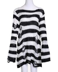 white ripped sweater