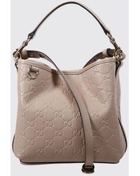 Gucci - Gg Emblem Leather Bucket Bag With Embossed Gg Monogram - Lyst