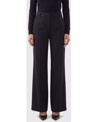 The Row - High-Waisted Flared Wool Palazzo Trousers - Lyst